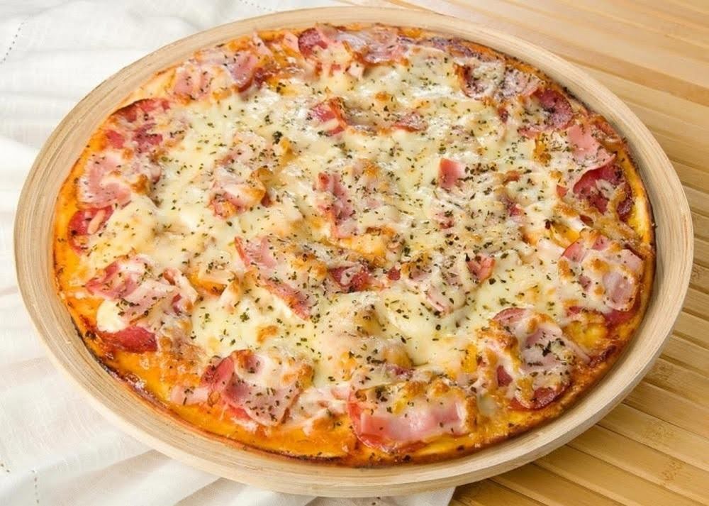 Рецепт піци з гарбузом – оригінальна страва, однаково сPizzaBoxчна і корисна 1 a pizza on a plate